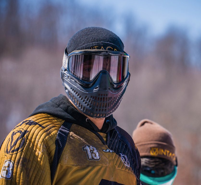 Tony, 13 on his chest and sleeve, masked up and ready on the field, March 2014.