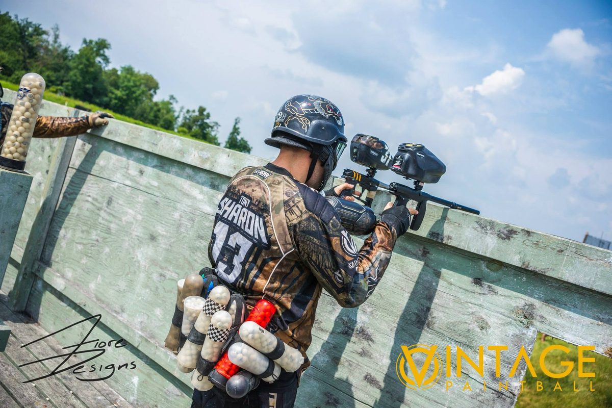 Tony, his name and 13 across his back, aims over a plywood wall at the 2014 Vintage Big Game.